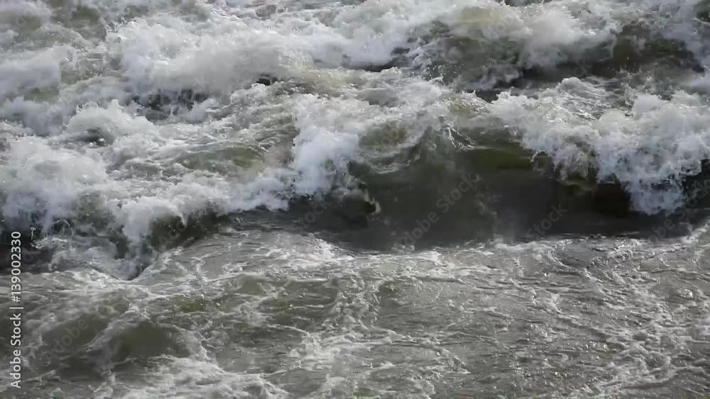 A wave of water under the dam A wave of water under the dam
