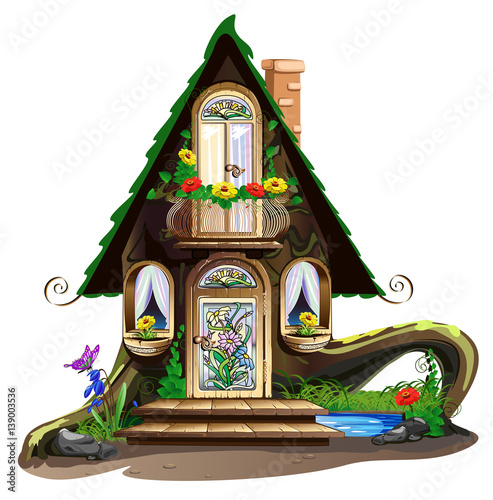 Fairytale wooden house with stained glass windows
