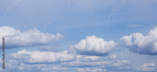 Fototapeta Naklejka Na Ścianę i Meble -  Blue sky with clouds and sun.