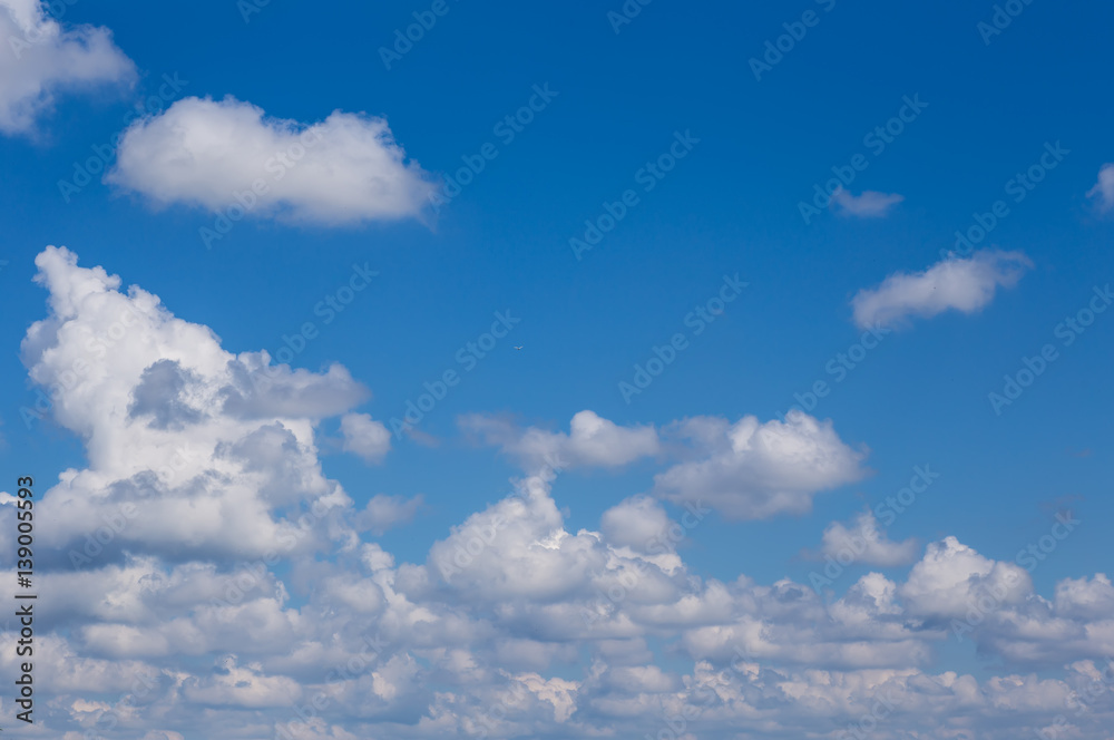the clouds drifting across the blue sky the clouds drifting across the blue sky