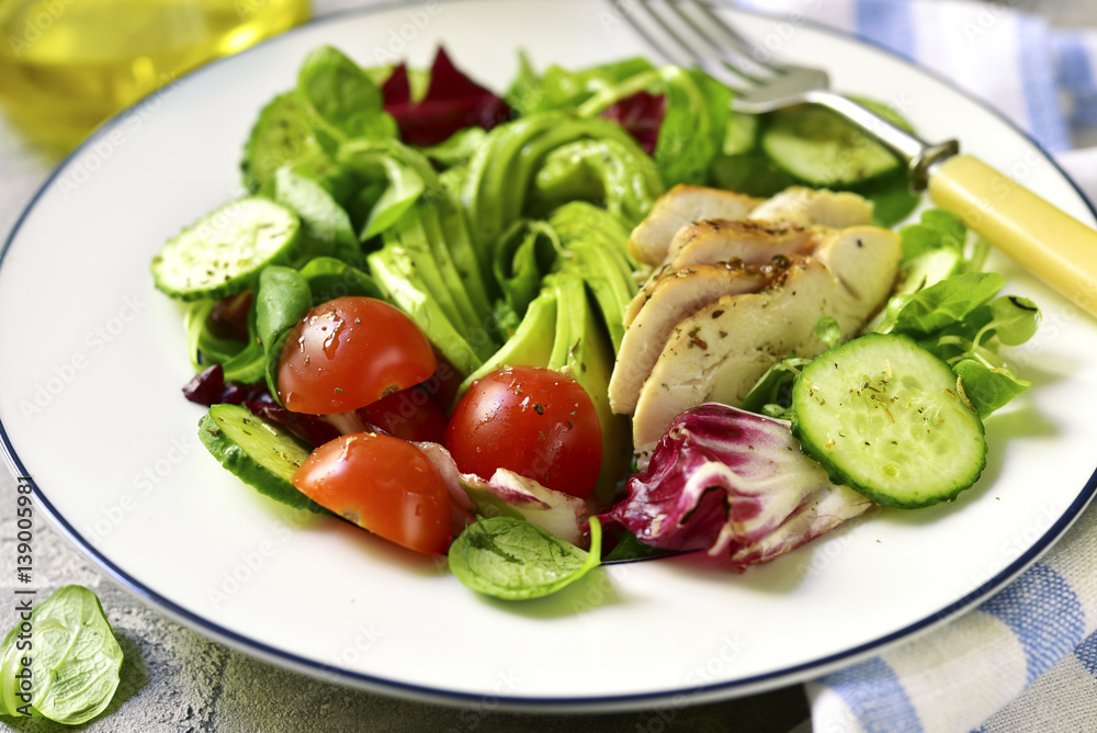 Fresh green salad with grilled chicken. Fresh green salad with grilled chicken.