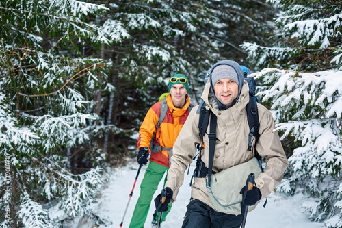 hikers on the trail in the Carpathians mountains at winter