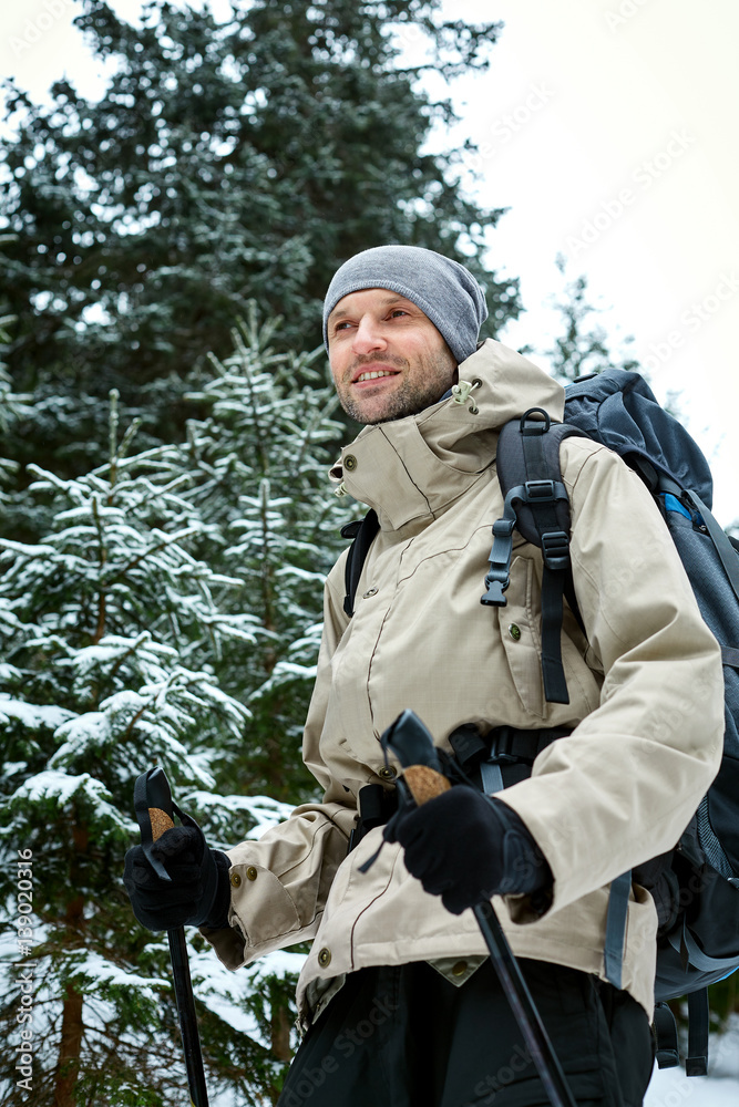 hiker on the trail in the Carpathians mountains at winter