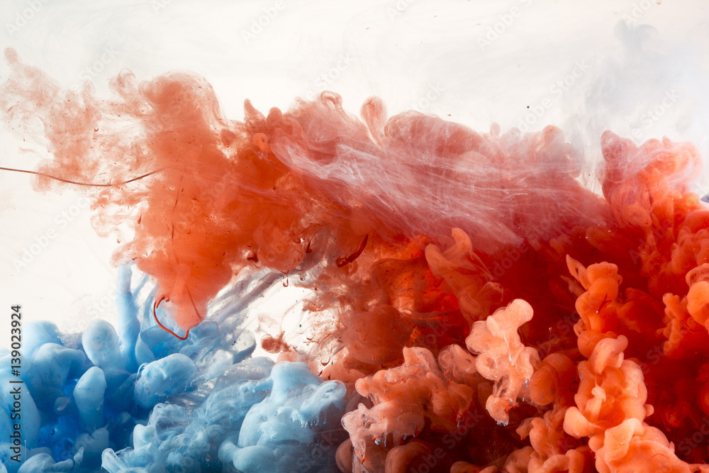 Abstract Red and Blue Paint in Water Background