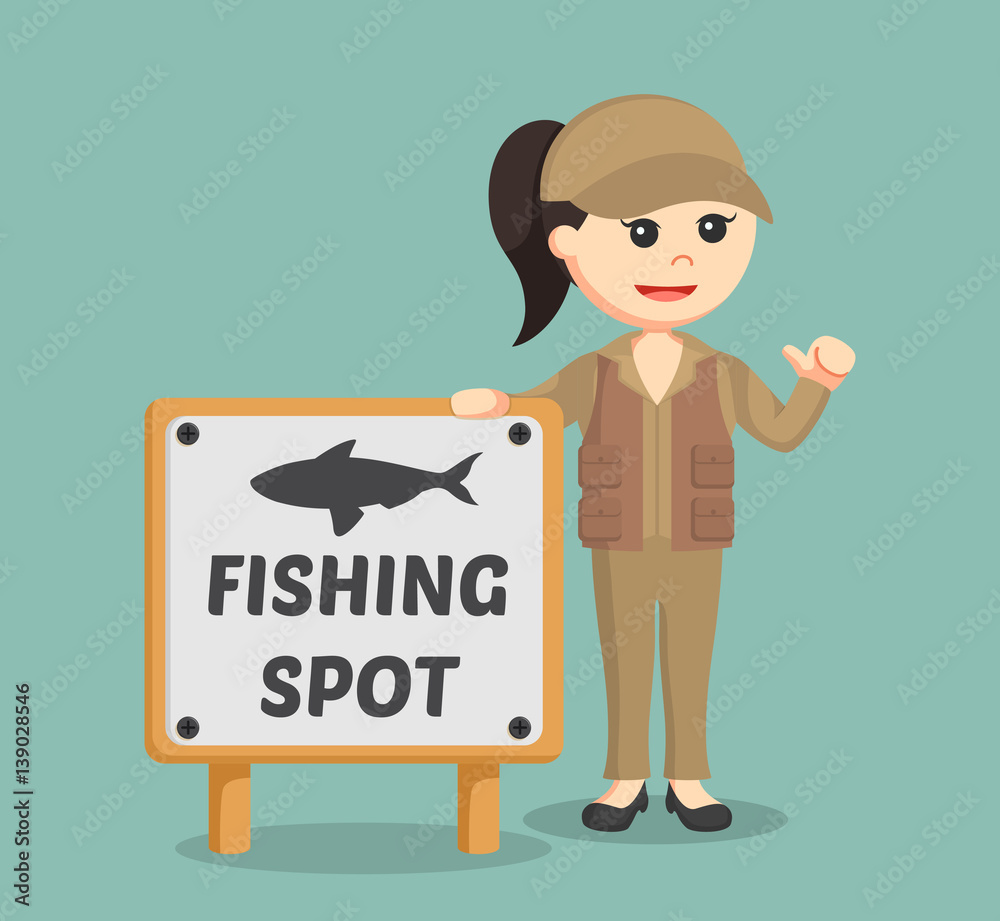 fisher woman standing beside fishing spot sign