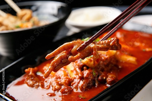 dakbal is korean style pub food Spicy chicken feet photo