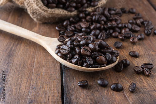 Coffee beans on old wood