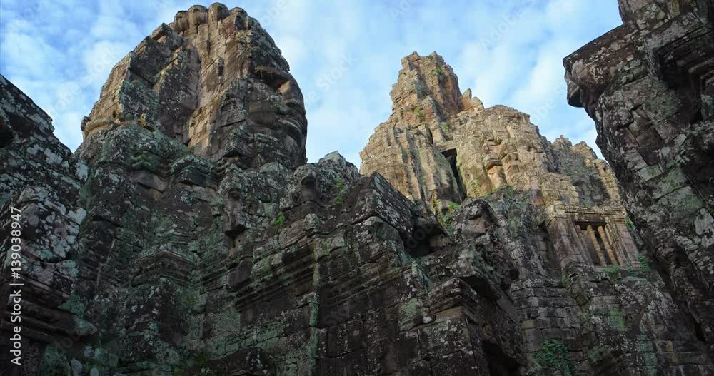 Low Angle Perspective of Ancient Ruins of Bayon Temple in Cambodia Low Angle Perspective of Ancient Ruins of Bayon Temple in Cambodia