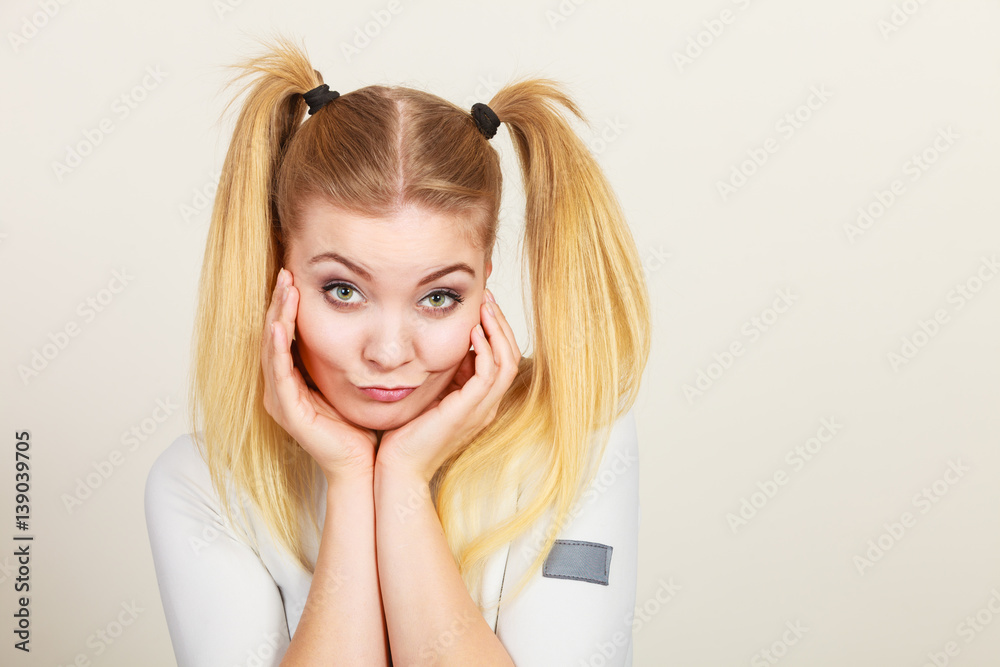 Happy blonde teenager girl with ponytails Happy blonde teenager girl with ponytails