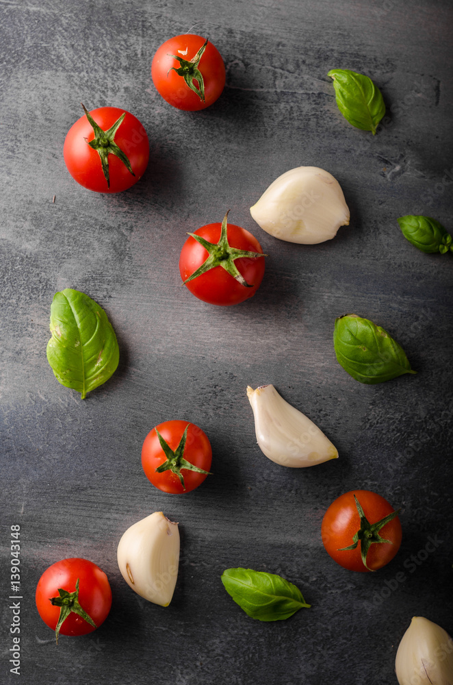Tomato garlic basil background Tomato garlic basil background