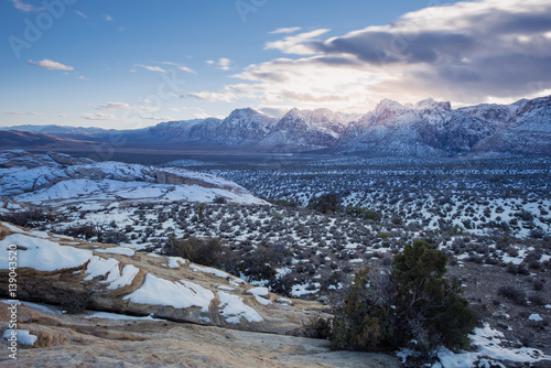Snow on Red rock Canyon national park and sunset © nuinthesky