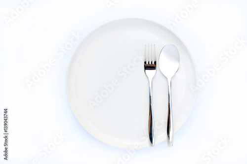 Top View Empty Dish with spoon and fork on white Background