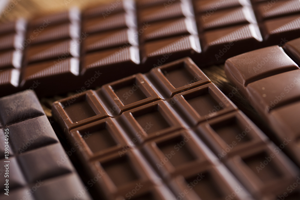 Chocolate bar, candy sweet, dessert food on wooden background Chocolate bar, candy sweet, dessert food on wooden background