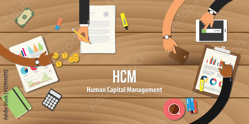 hcm human capital management illustration team work together with hand on wooden table with money graph paper work gold coin