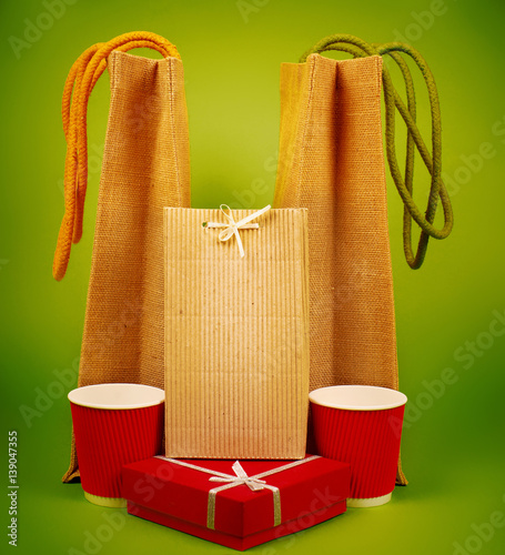 red gift box and two red paper cups