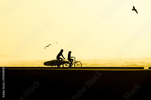 Photography Cycling together to the surf