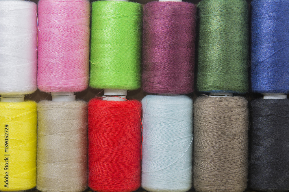 Spools of thread colorful background Spools of thread colorful background