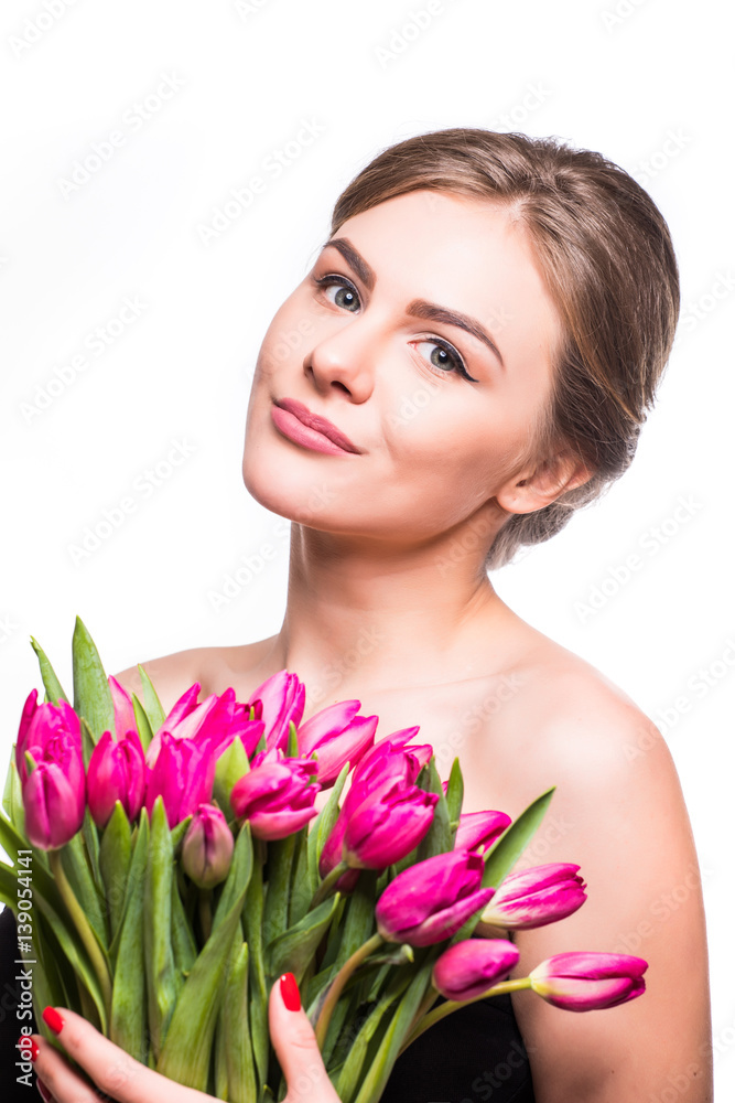 Portrait of beauty girl hugging tulips