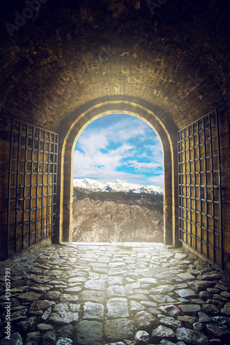 Open gate with mountain range view