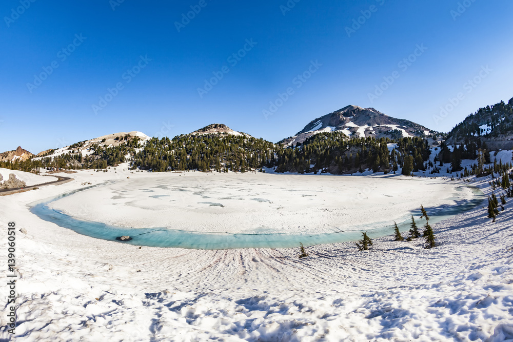 crater lake with snow on Mount Lassen in the Lassen volcanic national park
