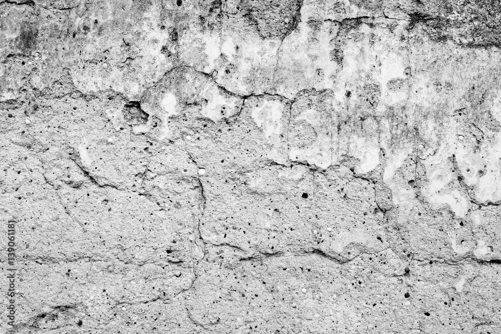 Wall fragment with scratches and cracks