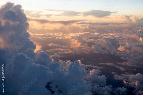 View of the clouds and airplane wing from the Inside