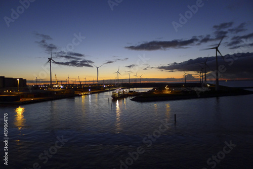 Energy windmills in sunset