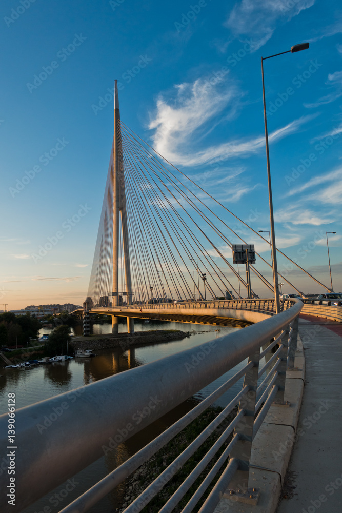 Cable bridge over Sava river at sunset in Belgrade, Serbia