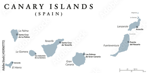 Canary Islands political map with capitals Las Palmas and Santa Cruz. The Canaries are an archipelago and autonomous community of Spain in Atlantic Ocean. Gray illustration, English labeling. Vector.
