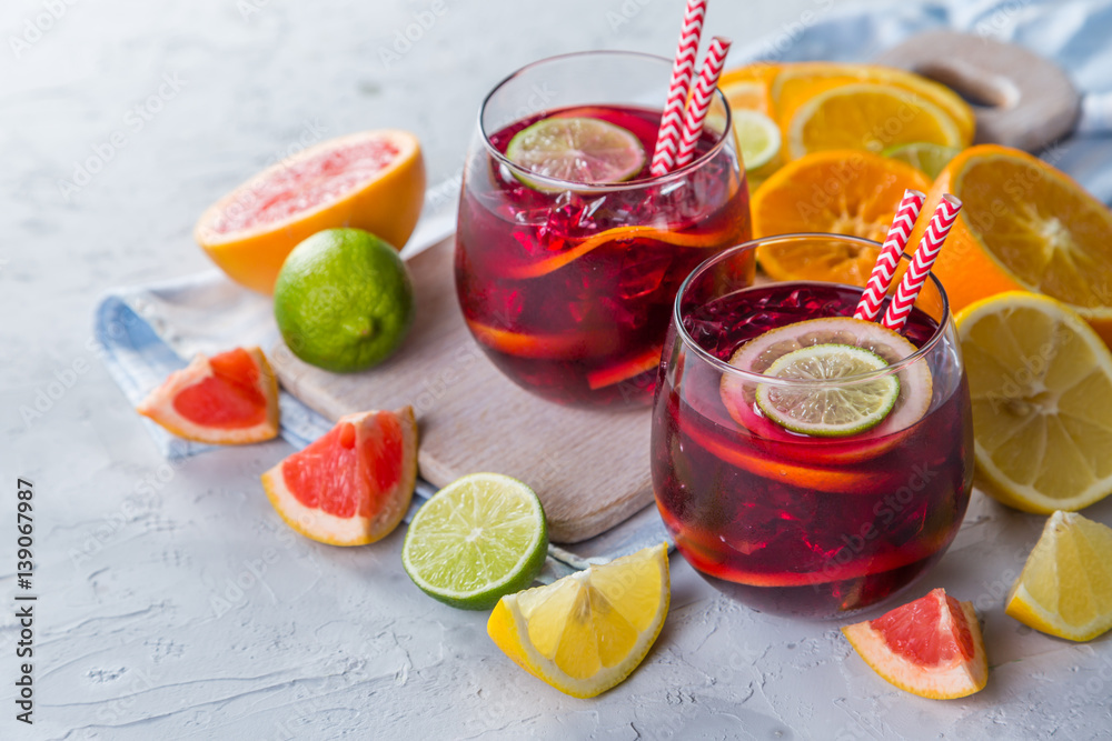Sangria and ingredients in glasses Sangria and ingredients in glasses