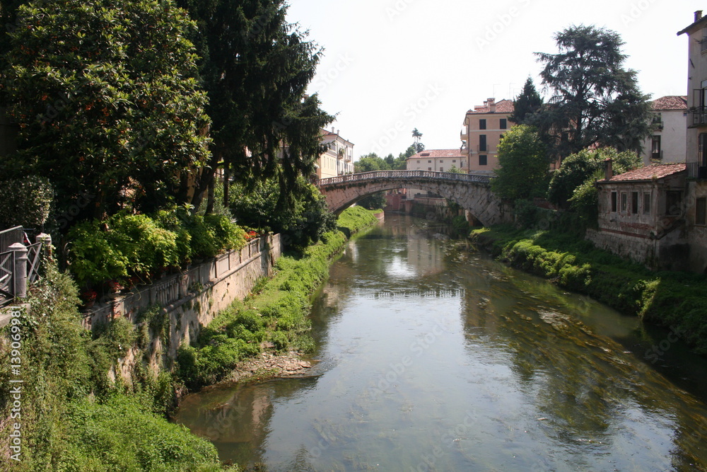 Old bridge on river in Vicenza Old bridge on river in Vicenza
