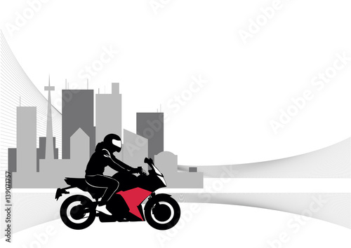 Image of motorcyclist riding on the background of the city