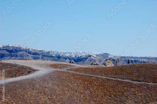 Coast of Santorini volcano  Greece. Caldera. Lifeless emissions of basalt  a reminder of the eruption. The view from the shore  From a trip to the Cycladic Archipelago