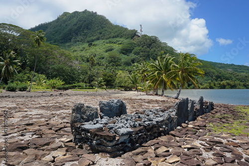 French Polynesia marae old stone structure on the shore of the lake Fauna Nui, Maeva, Huahine Nui island

 photo