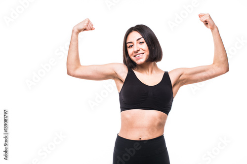 sport fitness woman flexing show her biceps muscles, young healthy smile girl athletic body, perfect figure © dianagrytsku