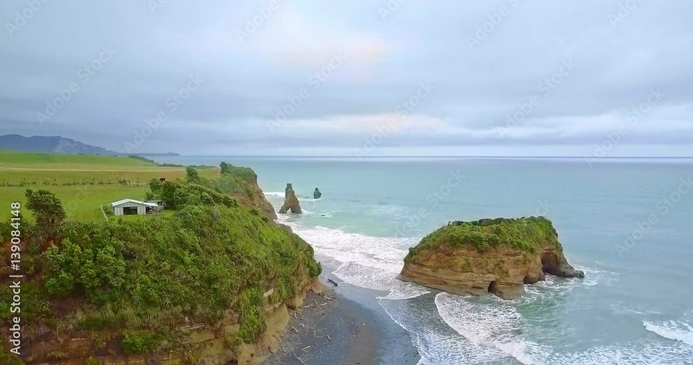 Aerial Shot of The Three Sisters and Elephant Rock, Taranaki, New Zealand. Aerial Shot of The Three Sisters and Elephant Rock, Taranaki, New Zealand.