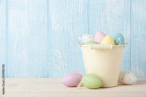 Easter colorful eggs in a bucket