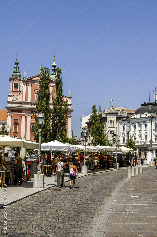 Ljubljana, street cafes, in background Franciscan church, Sloven