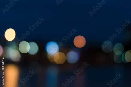 Blurred image background of bokeh at night. © thitikorn
