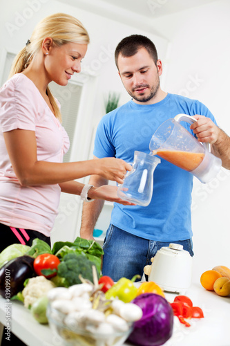 Couple making juice.