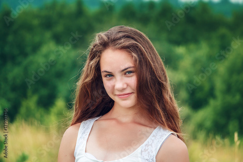 Beautiful girl in a field.