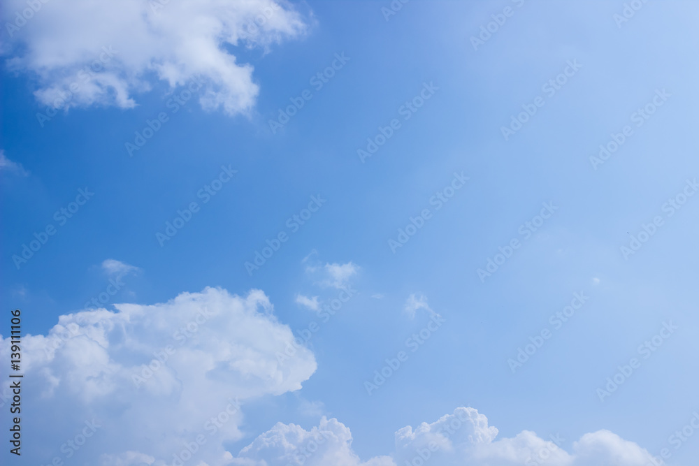 White fluffy clouds in the blue sky