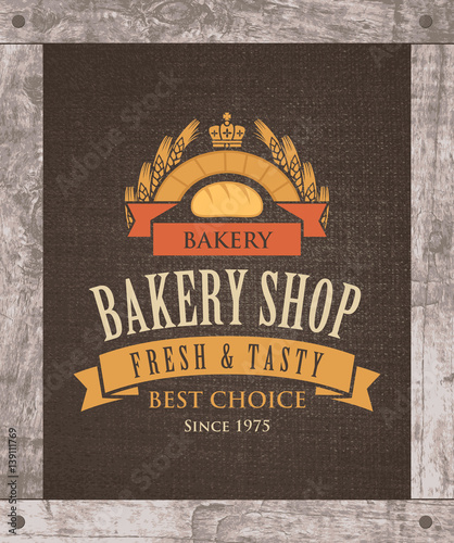 Vector banner for a bakery shop with a picture of the loaf and ears of wheat on the background of sacking and in wooden frame.
