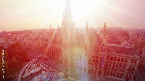 Aerial close-up Rathaus in Vienna, City Council fly over, tourism in Europe. Baroque architecture in urban world, flying over government building, travel sight seeing place in Austria
