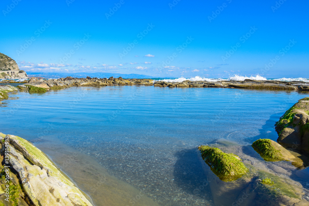Beautiful landscape, seascape, amazing nature background with rocks and blue water.