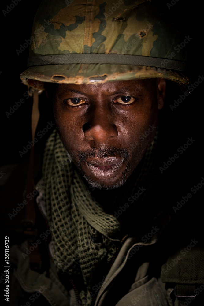 Portrait of African-American soldier from the Vietnam War suffering with PTSD.
