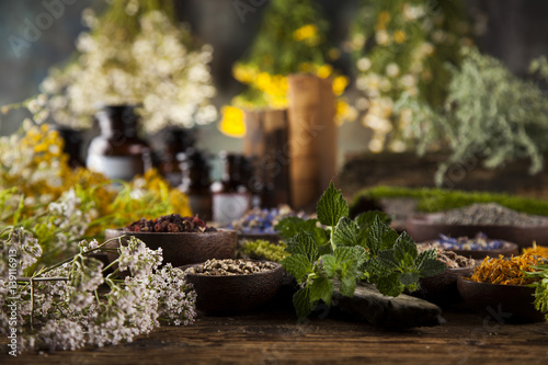 Herbal medicine on wooden desk background