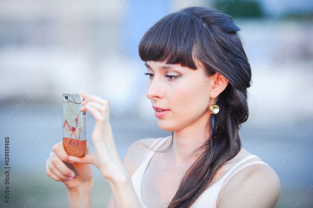 beautiful woman takes on the phone beautiful woman takes on the phone
