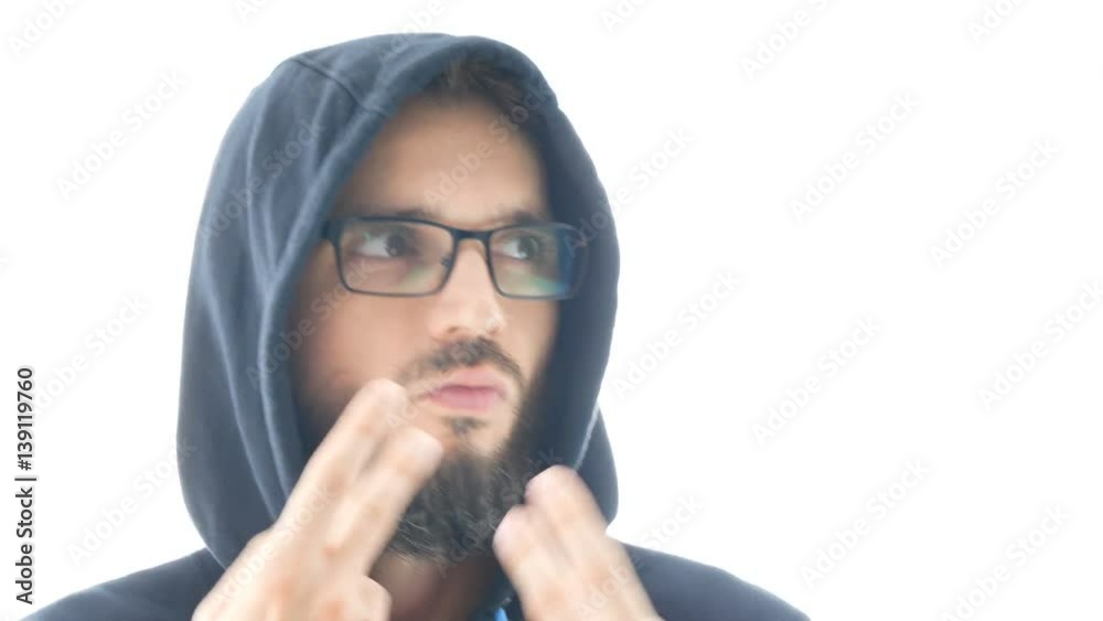 Closeup of self-confident bearded man in hoodie and eyeglasses dancing on contemporary electronic music, isolated on white background. Closeup of self-confident bearded man in hoodie and eyeglasses dancing on contemporary electronic music, isolated on white background.