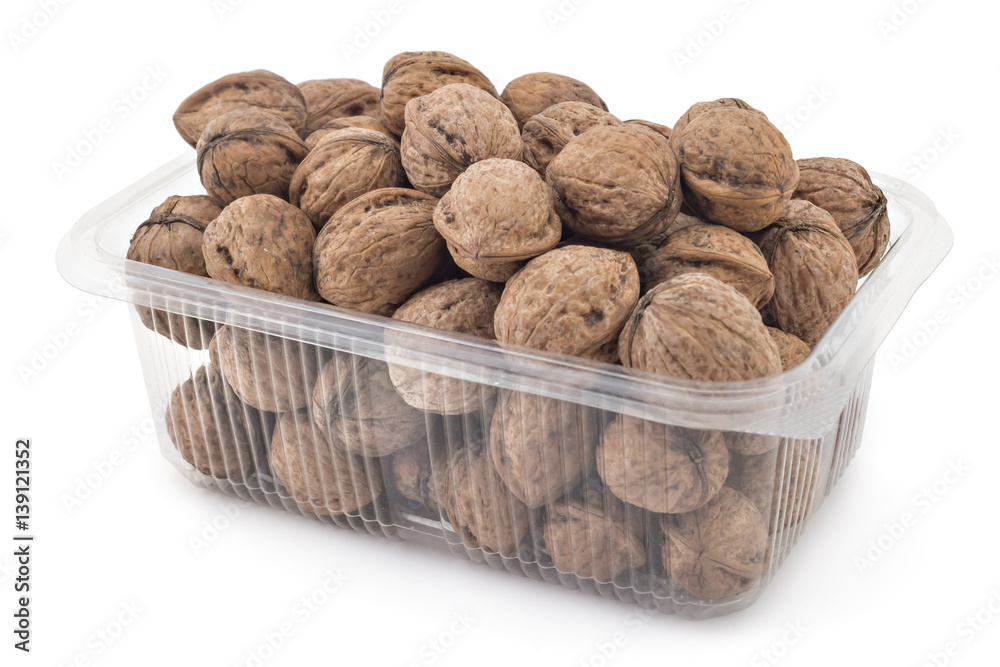 Box or punnet of dried walnuts isolated on a white background Box or punnet of dried walnuts isolated on a white background